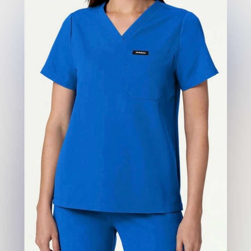 NWOT Jaanuu "Rhena" Essential 1-pocket scrub top in Royal Blue - S CLASSIC fit